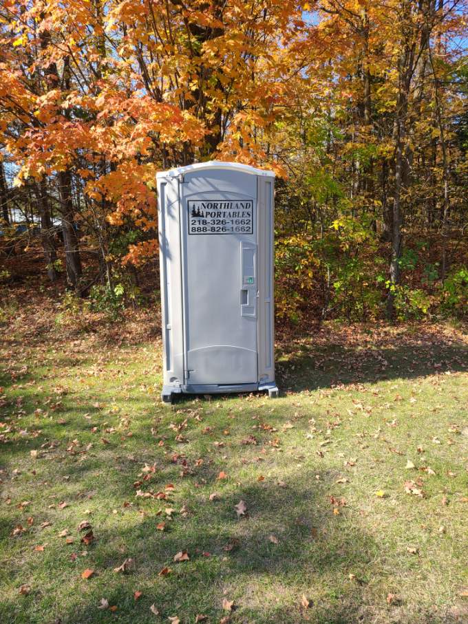 Gray Maxim portable restroom